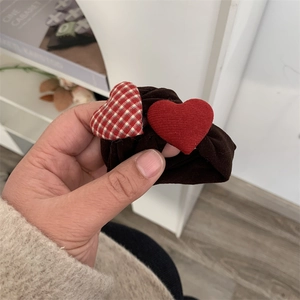 Brown fleece scrunchie with red checkered heart and solid red heart charms