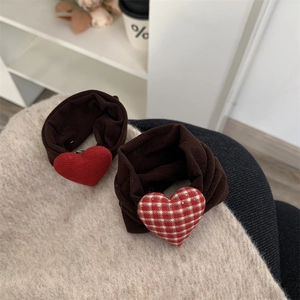 Set of two brown fabric hair scrunchies with red solid and checkered heart charms