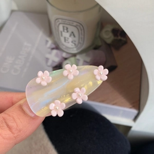 Handmade iridescent drop hair clip with 3D pink floral accents and white pearls