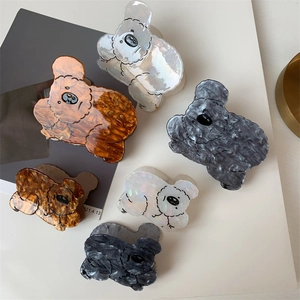 Detailed comparison of cute koala hair claws in acetate material with various sizes and colors