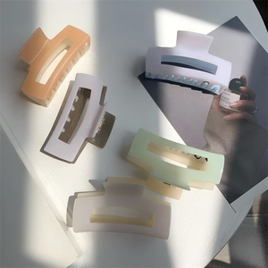 Five pieces of minimalist rectangular hair claws in various elegant matte pastel colors