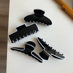 Pinces à cheveux minimalistes en acrylique noir et blanc aux formes géométriques