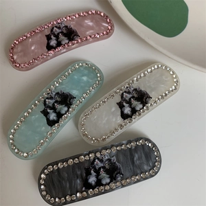 Chic cat print hair clips with sparkling rhinestones in four elegant marble colors
