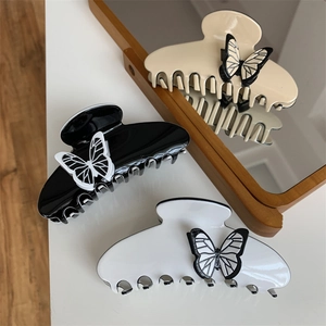 Elegant French vintage butterfly hair claw clips in beige, black and white set