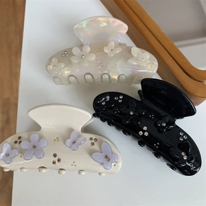 Eleganti mollette per capelli con fiori e farfalle e cristalli in bianco, crema e nero
