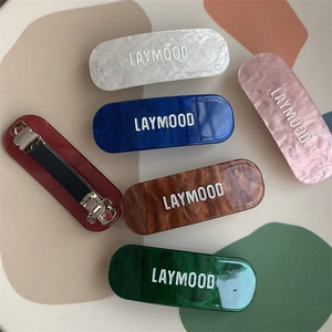 Lot de 6 barrettes en acétate coloré avec texture marbrée et fermoir en métal