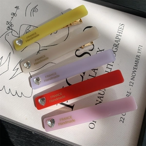 Five-piece heart rhinestone rectangular matte hair clips in assorted pastel colors