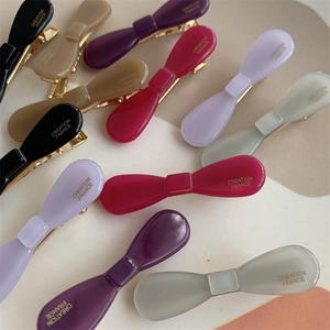 Minimalist acetate bow hair clips in multiple colors with Creation France gold metal grip