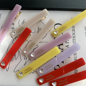 Chic multi-color rectangular hair clips set with heart rhinestones on French cards