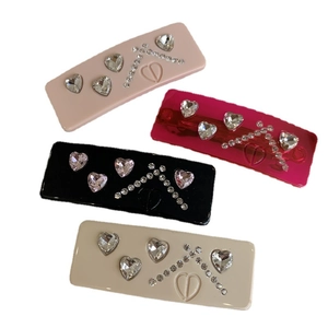 Set of 4 elegant rectangular hair clips with heart crystals and geometric diamond patterns