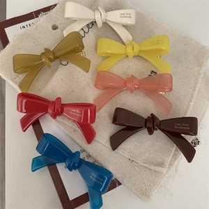 Lot de barrettes nœuds en acétate sept couleurs avec lettrage doré fait main