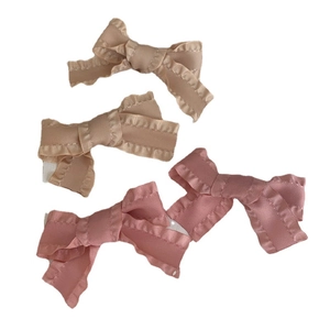 Pink and champagne bow hair clips with ruffled edges for women and girls four piece set