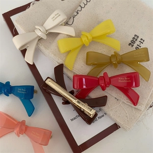 Barrettes élégantes multicolores en acétate avec nœud et bec de canard pour femmes