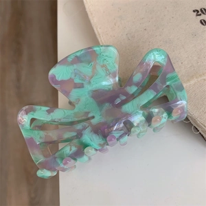 Pink and purple marble textured acetate hair claw clip with handmade gold lettering
