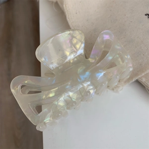 Iridescent pearl white acetate hair claw clip with rainbow glossy finish detail