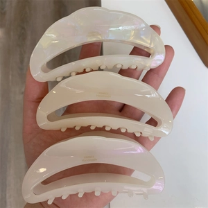 Three-piece set of beige pearlescent acetate crescent hair claws with gold handmade text