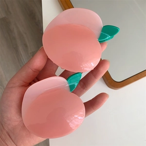 Pince à cheveux pêche chic en acétate rose avec détail de feuille verte pour femme