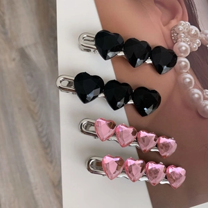 Set di quattro fermagli per capelli a forma di cuore rosa e nero con base in metallo