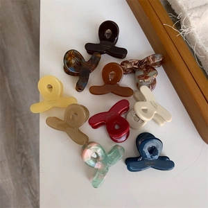 Lot de dix pinces à cheveux en acétate aux couleurs unies et motifs marbrés avec texte Sunshine