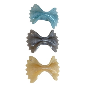 Three-piece acetate bow hair clip set in light blue, marble grey and beige colors