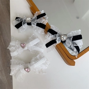 Elegant lace and velvet bow hair clips with heart-shaped rhinestones for hair accessories