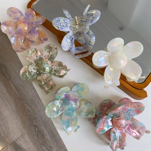 Floral acetate hair claw clips with elegant marble patterns for women in various colors