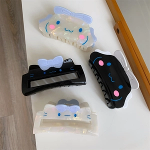 Set mit vier süßen Acetat-Haarklammern mit blauen 3D-Schleifen und Perlglanz-Effekt
