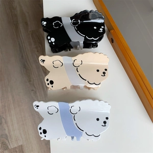 Lindas pinzas para el cabello de acetato con forma de caniche en negro, albaricoque y blanco