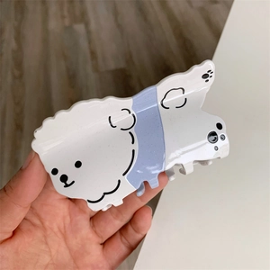 Pinza de pelo de perrito hecha de acetato pulido blanco y morado con detalles brillantes