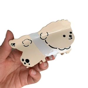 Lindo clip de pelo de acetato con forma de perro Bichon crema para niñas con acabado brillante