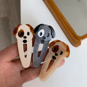 Cute squinting dog hair claw clips made of premium acetate in three assorted colors