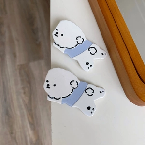 Set of two cartoon puppy hair clips made of glossy white acrylic for kids and women