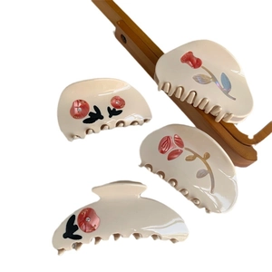 Set of 4 vintage beige floral hair claws with tulip and rose resin relief designs