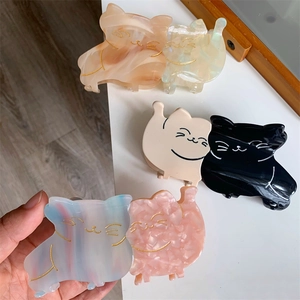 Set of cute cartoon cat hair claws in acetate finish with gold accents for women