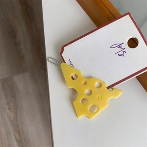 Pince à cheveux créative en résine jaune design fromage suisse avec trous ronds