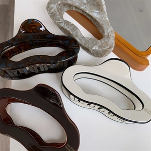 Large irregular acetate hair claw clips in four patterns for thick hair styling