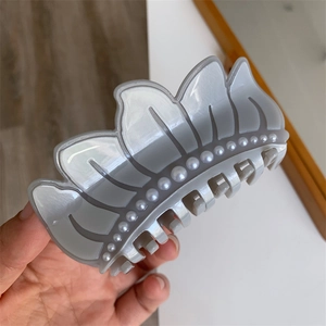 Elegant pearl acetate hair claw clip in light grey with flower-inspired design for women