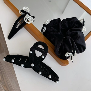 Elegant 3-piece black velvet hair accessory set with white pearl bow and hair claw clip