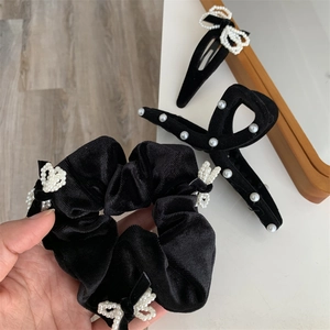 Black velvet hair accessories set with pearl bows including scrunchie, claw clip and duckbill clip