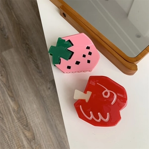 Cute fruit hair claw set featuring strawberry and red apple designs in shiny acrylic finish