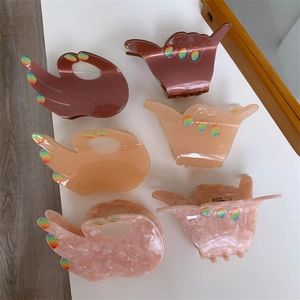 Fashionable acetate OK hand gesture hair claws in brown and marble pink set