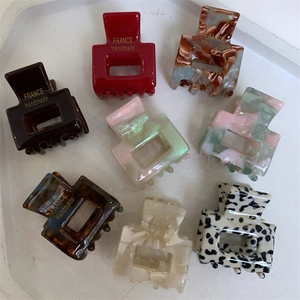 Collection of minimalist square hair claws in tortoiseshell and marble patterns