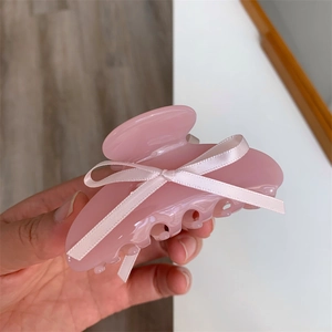 Pince à cheveux en acétate rose avec nœud en satin blanc pour coiffures élégantes