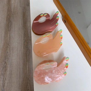 Chic hand gesture acetate hair claws with rainbow nails in three marbled colors