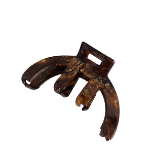 French vintage brown tortoise shell hair claw clip with golden accent for elegant styling