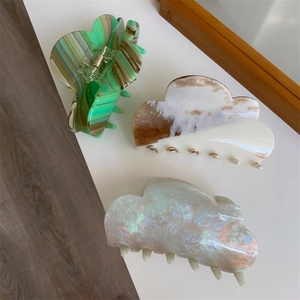 Chic acetate cloud hair claws set in marble green and pearlescent finishes for women