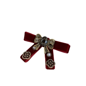 Elegant dark red velvet bow hair clip with vintage gemstones and baroque pearls