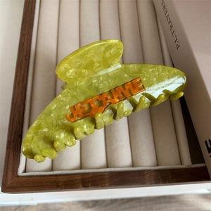 Elegant green marble acetate hair claw clip with orange JE T'AIME letter design