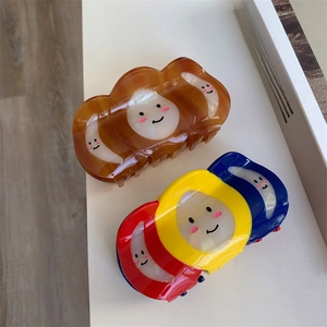 Grande pince à cheveux avec motifs smiley et contraste tricolore en résine brillante