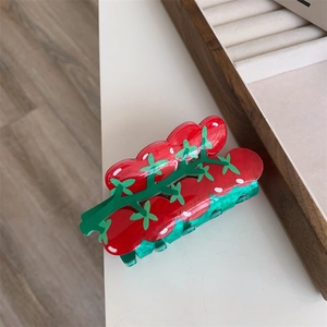 Creative red cherry tomato shaped hair claw clip with green vine detail for women